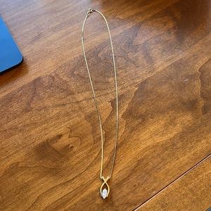 Costume piece Diamond pendant on gold chain